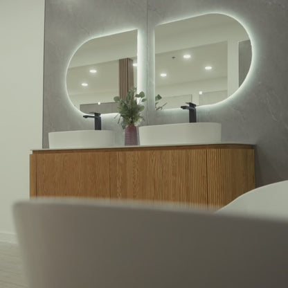 CAPRI 71-inch natural oak floating double bathroom vanity with curved wavy design, porcelain countertop, dual resin basins and Gemini LED mirror