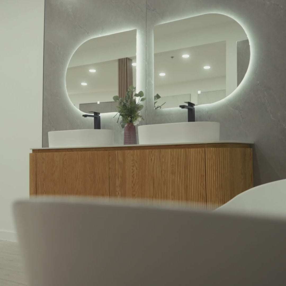 CAPRI 71-inch natural oak floating double bathroom vanity with curved wavy design, porcelain countertop, dual resin basins and Gemini LED mirror