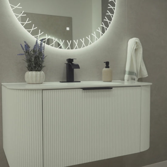 VEGAS 39-inch white fluted floating bathroom vanity with black aluminum handle, seamless integrated sink and Vega LED backlit mirror