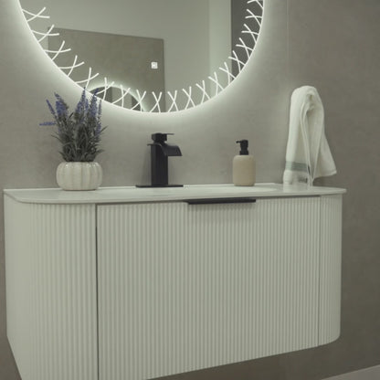 VEGAS 39-inch white fluted floating bathroom vanity with black aluminum handle, seamless integrated sink and Vega LED backlit mirror